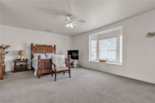 825 W Ryan Ave, Overton, NV 89040 - carpeted bedroom with ceiling fan and baseboards