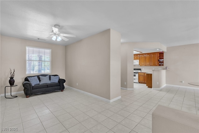 825 W Ryan Ave, Overton, NV 89040 - unfurnished living room featuring ceiling fan and light tile patterned flooring
