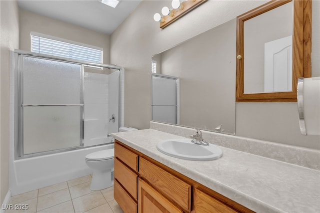 825 W Ryan Ave, Overton, NV 89040 - bathroom featuring vanity, tile patterned flooring, and bath / shower combo with glass door
