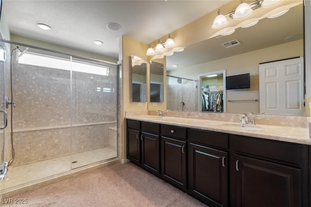 6705 Philharmonic Ave, Las Vegas, NV 89139 - bathroom with double vanity and a stall shower