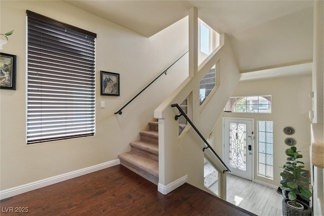 6705 Philharmonic Ave, Las Vegas, NV 89139 - foyer entrance featuring wood finished floors, stairs, and a high ceiling