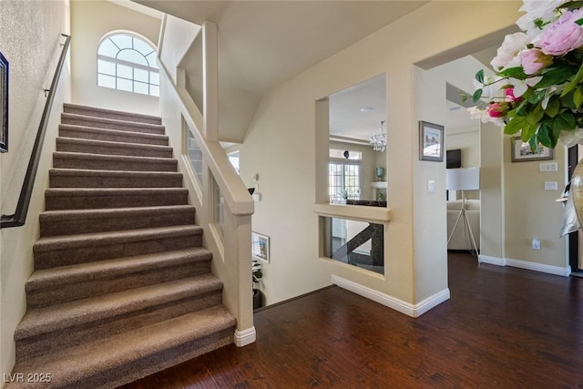 6705 Philharmonic Ave, Las Vegas, NV 89139 - stairway featuring wood finished floors and baseboards