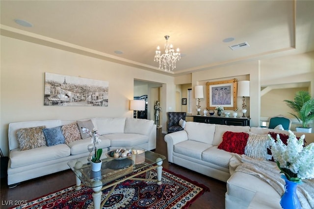 6705 Philharmonic Ave, Las Vegas, NV 89139 - living room with a chandelier and wood finished floors