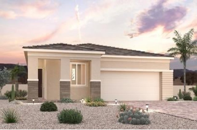 8416 Vanhoy Creek St, Las Vegas, NV 89166 - view of front facade featuring stucco siding and decorative driveway
