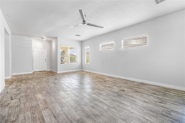 3257 Rushing Waters Pl, Las Vegas, NV 89135 - unfurnished room featuring light wood-style flooring and ceiling fan
