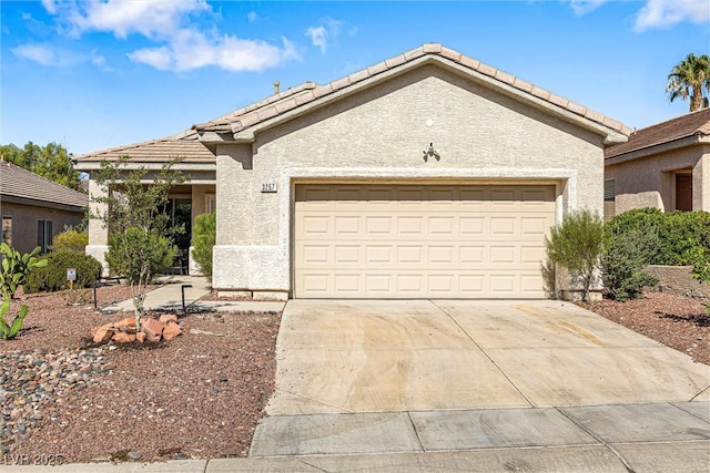 3257 Rushing Waters Pl, Las Vegas, NV 89135 - single story home with concrete driveway, a tiled roof, an attached garage, and stucco siding