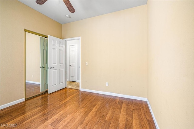 3257 Rushing Waters Pl, Las Vegas, NV 89135 - unfurnished bedroom with wood finished floors, ceiling fan, and a closet
