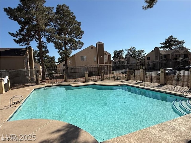 2698 Alicialynn Way, Las Vegas, NV 89121 - community pool featuring a residential view and a patio area