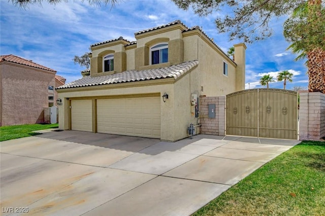 2073 Sapphire Valley Ave, Henderson, NV 89074 - mediterranean / spanish house with stucco siding, a gate, a garage, driveway, and a tiled roof
