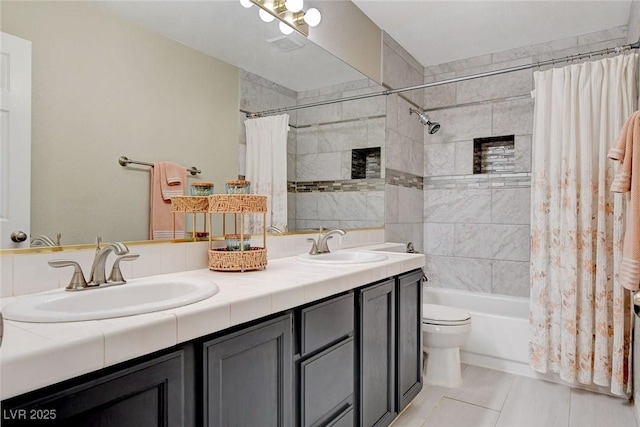 2073 Sapphire Valley Ave, Henderson, NV 89074 - full bath with double vanity, shower / tub combo, and tile patterned flooring