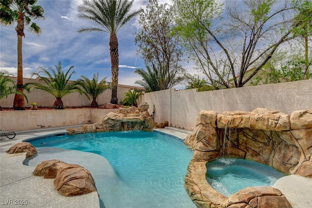2073 Sapphire Valley Ave, Henderson, NV 89074 - view of pool featuring a fenced backyard and a pool with connected hot tub