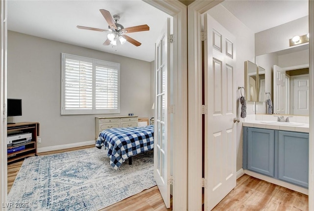 2073 Sapphire Valley Ave, Henderson, NV 89074 - bedroom featuring light wood-style floors and a ceiling fan