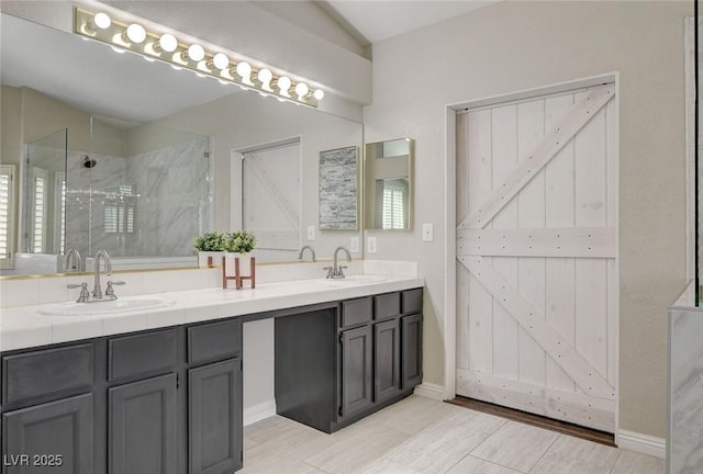 2073 Sapphire Valley Ave, Henderson, NV 89074 - full bath featuring double vanity and a tile shower