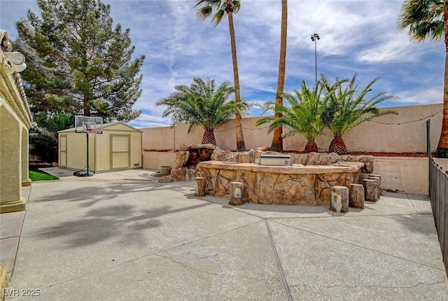 2073 Sapphire Valley Ave, Henderson, NV 89074 - view of patio with a storage shed