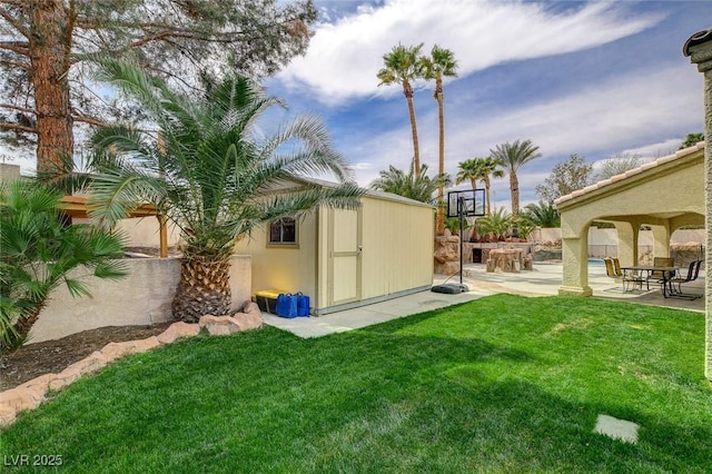 2073 Sapphire Valley Ave, Henderson, NV 89074 - view of yard with a patio and a storage unit