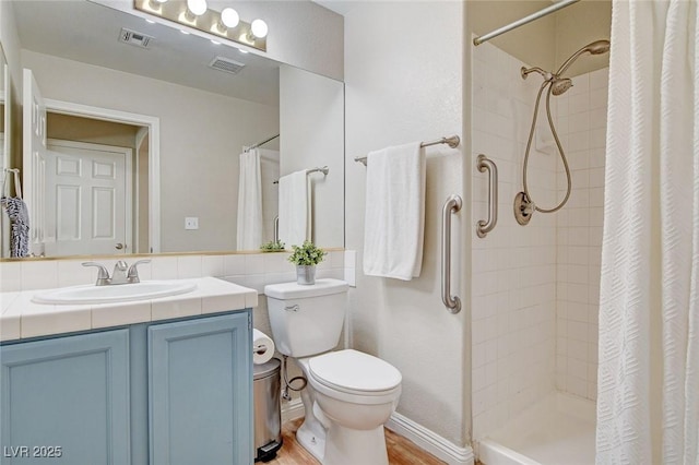 2073 Sapphire Valley Ave, Henderson, NV 89074 - bathroom with vanity and a tile shower