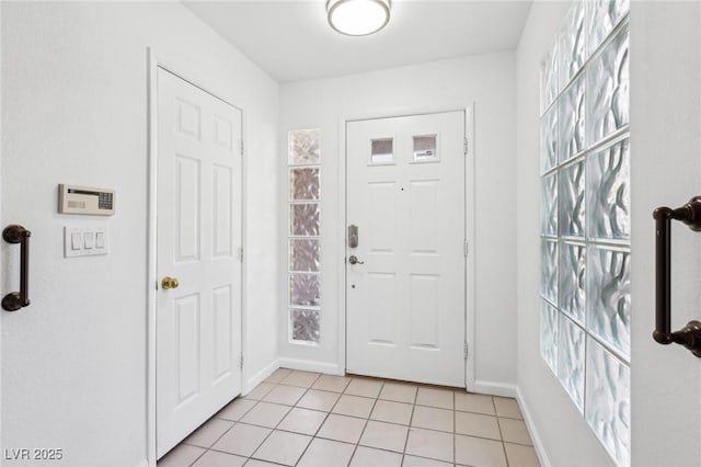 1911 Hobson Dr, Henderson, NV 89074 - foyer entrance featuring light tile patterned floors and baseboards
