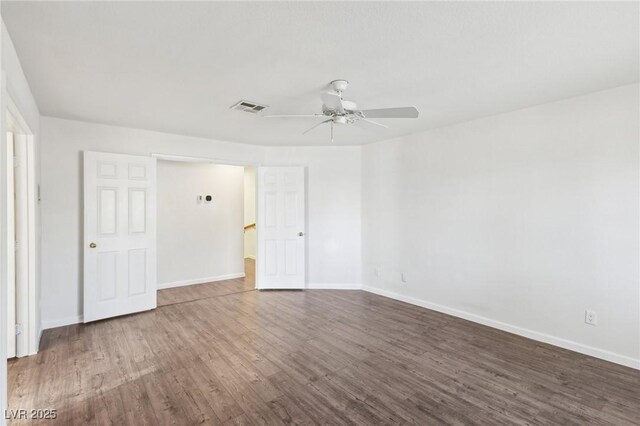 1911 Hobson Dr, Henderson, NV 89074 - empty room featuring dark wood finished floors and ceiling fan