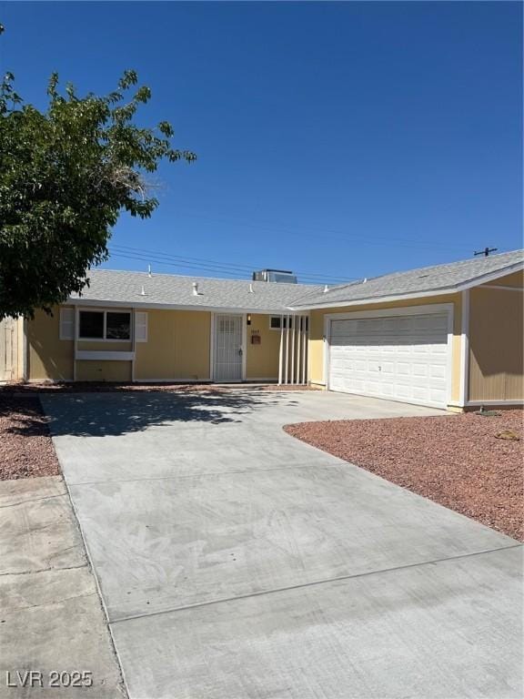 1809 Lamplighter Ln, Las Vegas, NV 89104 - ranch-style home with driveway and an attached garage