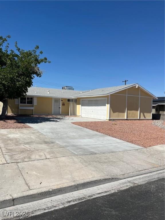 1809 Lamplighter Ln, Las Vegas, NV 89104 - ranch-style home featuring an attached garage and concrete driveway