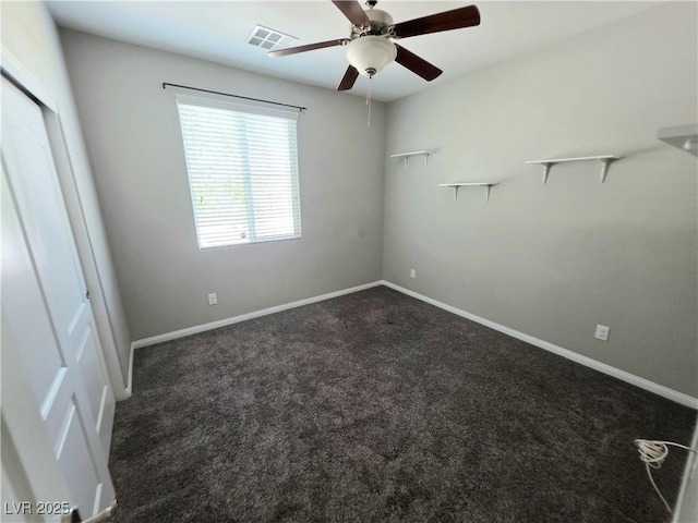 3708 Fuselier Dr, North Las Vegas, NV 89032 - unfurnished bedroom featuring dark carpet and a ceiling fan