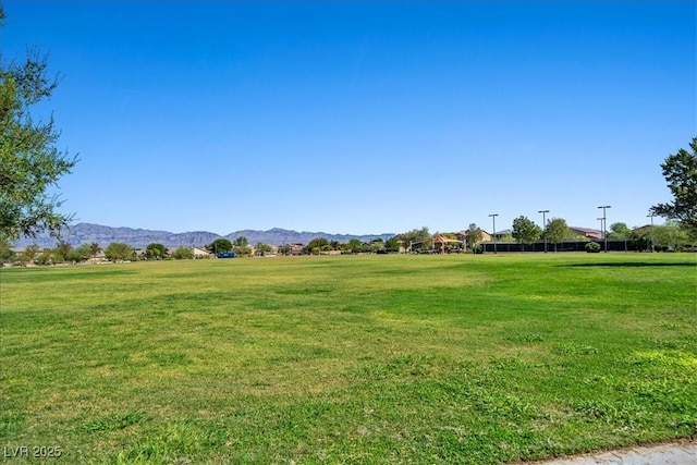 3708 Fuselier Dr, North Las Vegas, NV 89032 - view of property's community featuring a mountain view and a lawn