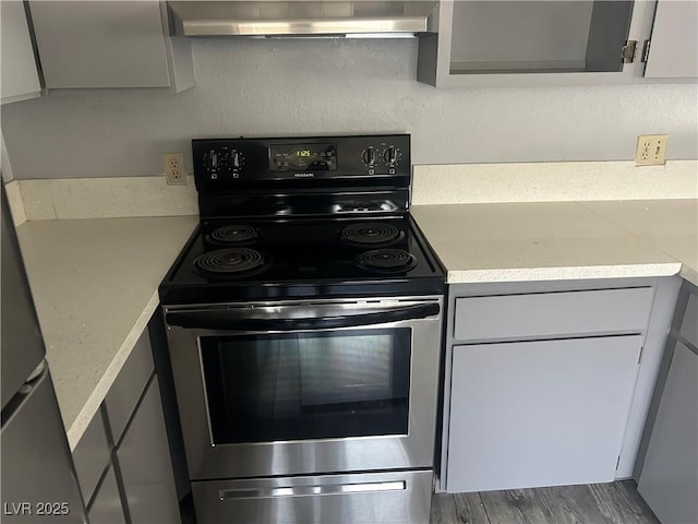 2722 Alicialynn Way, Las Vegas, NV 89121 - kitchen featuring stainless steel electric stove, range hood, light countertops, and gray cabinetry