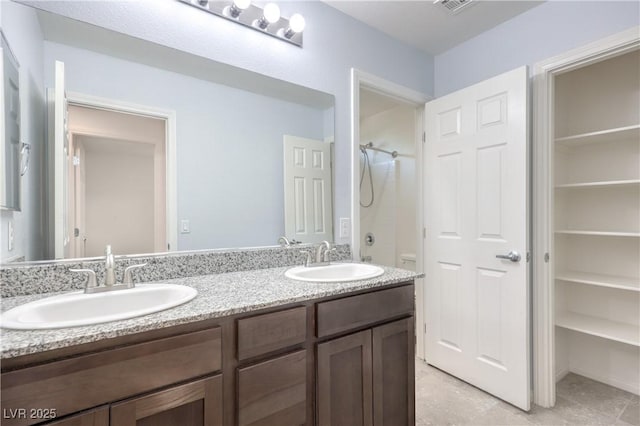 2300 Sky Island Dr, Henderson, NV 89002 - full bath featuring double vanity and a shower
