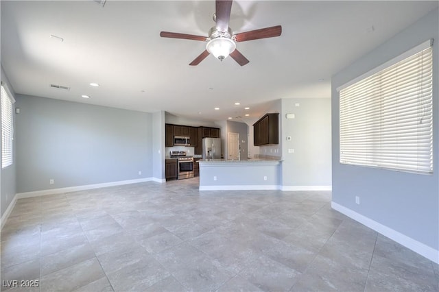 2300 Sky Island Dr, Henderson, NV 89002 - unfurnished living room with ceiling fan and recessed lighting
