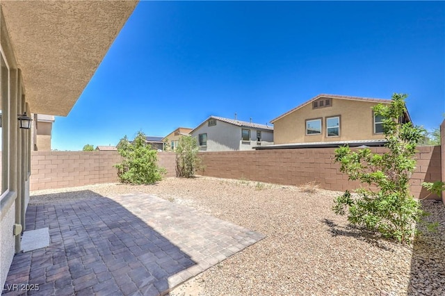 2300 Sky Island Dr, Henderson, NV 89002 - fenced backyard featuring a patio area
