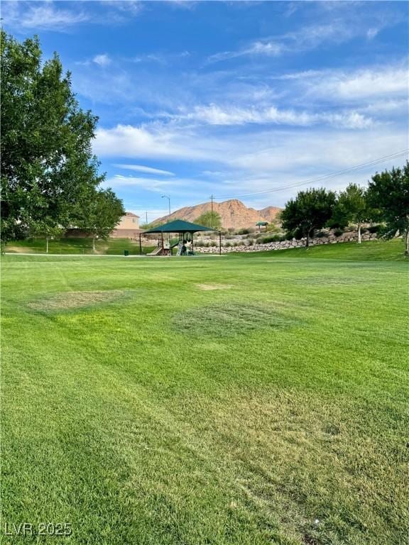 2300 Sky Island Dr, Henderson, NV 89002 - view of green lawn featuring a mountain view