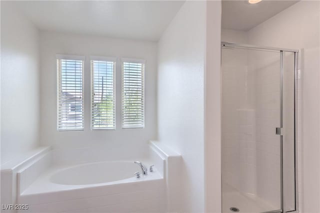 2300 Sky Island Dr, Henderson, NV 89002 - bathroom featuring plenty of natural light, a stall shower, and a garden tub