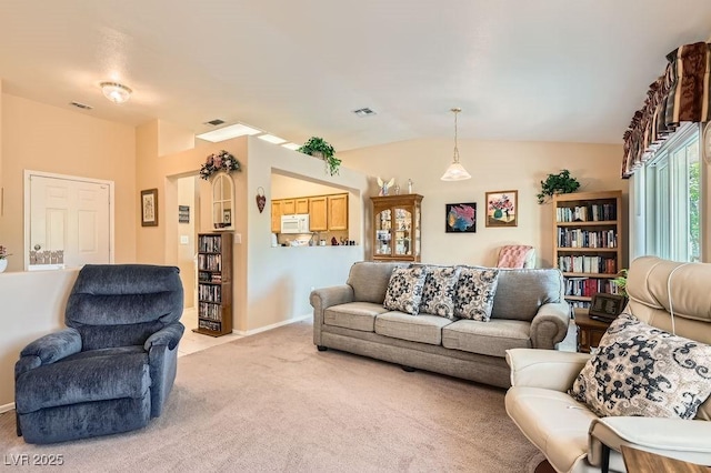2085 Joy View Ln, Henderson, NV 89012 - living room featuring light colored carpet and vaulted ceiling