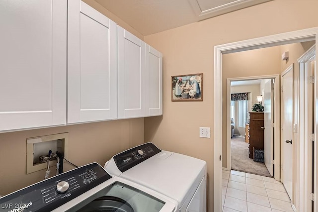 2085 Joy View Ln, Henderson, NV 89012 - laundry area with cabinet space, washer and clothes dryer, and light tile patterned floors
