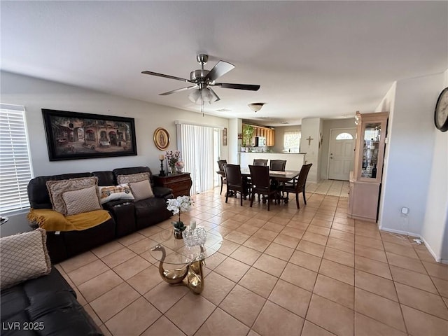 8898 Promised Land Ave, Las Vegas, NV 89148 - living area featuring light tile patterned flooring and ceiling fan