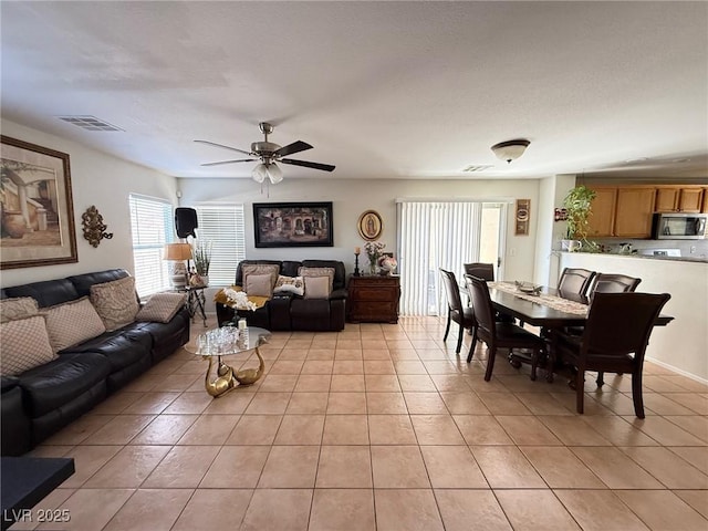 8898 Promised Land Ave, Las Vegas, NV 89148 - living room with light tile patterned floors and ceiling fan