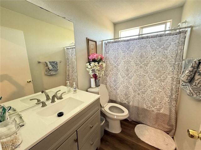 8898 Promised Land Ave, Las Vegas, NV 89148 - full bath featuring wood finished floors, vanity, and a shower with curtain