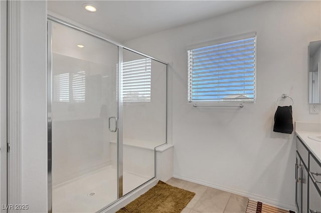 7853 Bethel Heights Ln, Las Vegas, NV 89113 - full bathroom featuring vanity, a stall shower, tile patterned floors, and recessed lighting