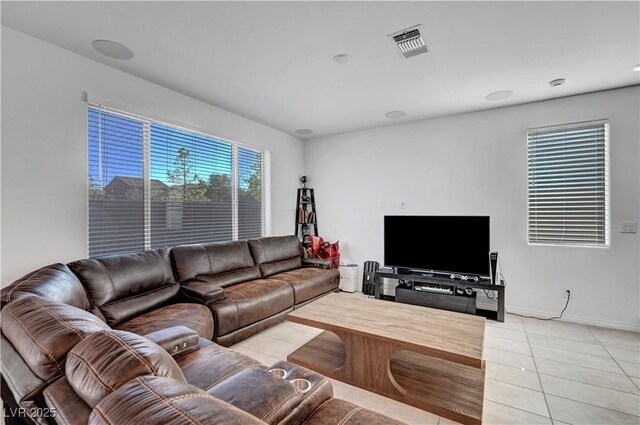 7853 Bethel Heights Ln, Las Vegas, NV 89113 - living room with light tile patterned floors and baseboards