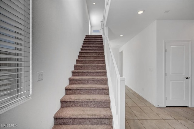 7853 Bethel Heights Ln, Las Vegas, NV 89113 - stairway featuring tile patterned flooring and recessed lighting