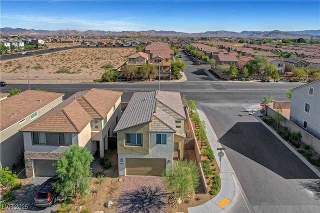7853 Bethel Heights Ln, Las Vegas, NV 89113 - aerial view of residential area with a mountainous background