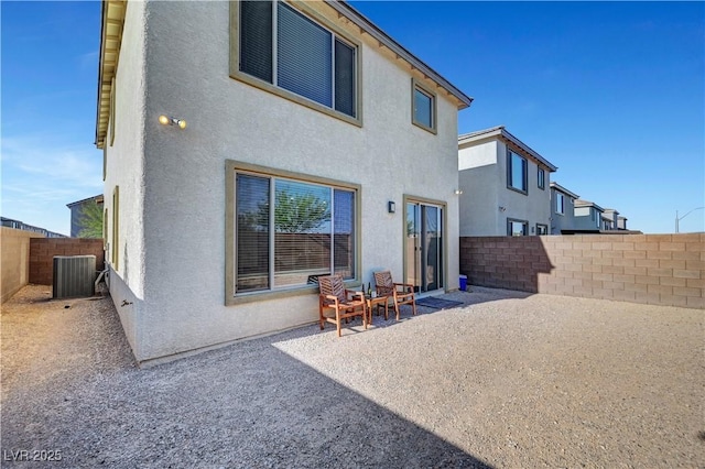 7853 Bethel Heights Ln, Las Vegas, NV 89113 - back of house featuring a patio area, a fenced backyard, and stucco siding