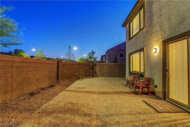 7853 Bethel Heights Ln, Las Vegas, NV 89113 - fenced backyard with a patio area