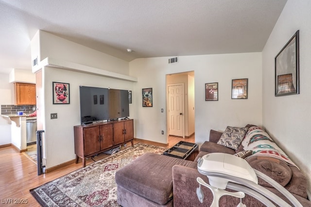 520 Arrowhead Trl Unit 522, Henderson, NV 89015 - living area with light wood-type flooring and baseboards