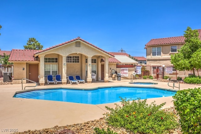 520 Arrowhead Trl Unit 522, Henderson, NV 89015 - community pool featuring a hot tub and a patio