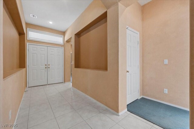 745 Diamond Bend Ave, Las Vegas, NV 89123 - hall with light tile patterned floors and baseboards
