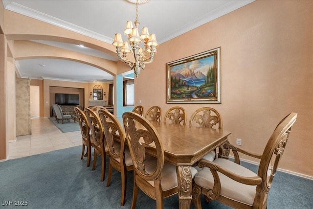 745 Diamond Bend Ave, Las Vegas, NV 89123 - dining area featuring arched walkways, light colored carpet, a chandelier, ornamental molding, and light tile patterned floors
