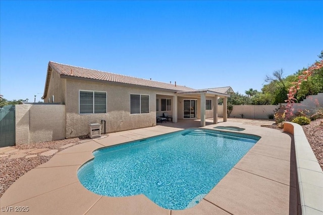 745 Diamond Bend Ave, Las Vegas, NV 89123 - view of swimming pool featuring an in-ground hot tub, a patio area, and a fenced backyard