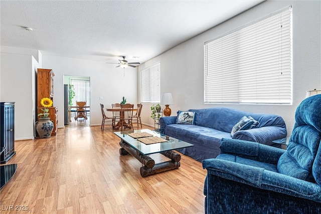 8853 Kingswood Dr, Las Vegas, NV 89147 - living room with ceiling fan and light wood-style flooring