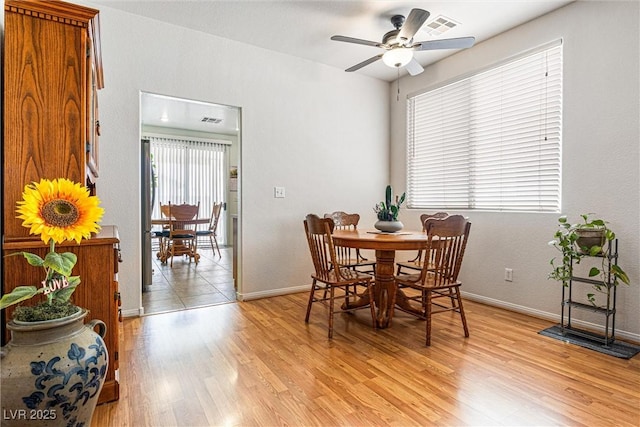 8853 Kingswood Dr, Las Vegas, NV 89147 - dining space with light wood-type flooring and a ceiling fan